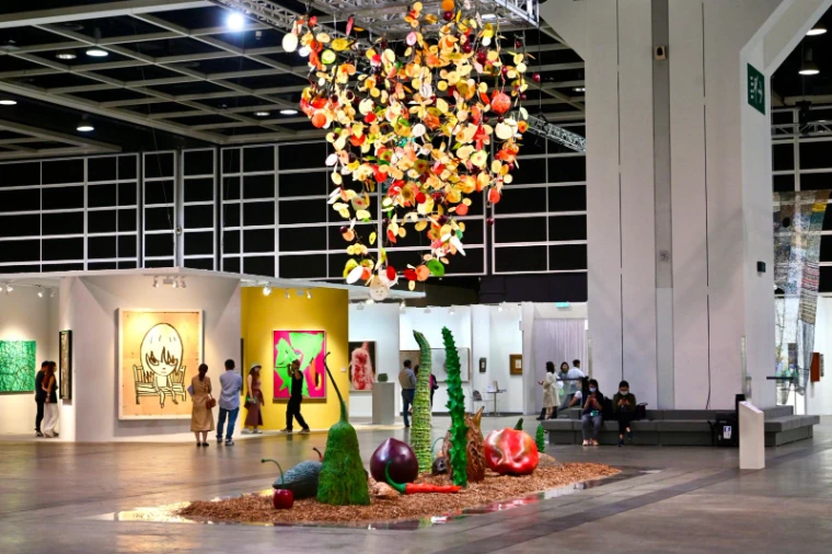 A suspended fruit installation hanging above the Encounters sector at Art Basel Hong Kong, an engagement in the season calendar of The Mansa Court