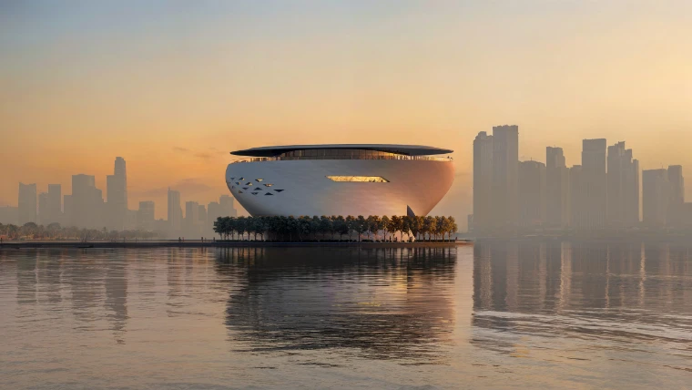 The design for the Dubai Museum of Art by Tadao Ando, a pale bowl rising from the water against the city skyline at dusk, at Art Dubai, an early-April engagement in the season calendar of The Mansa Court