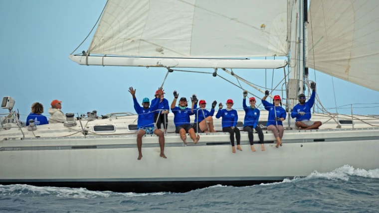 Crew on the foredeck during the round-the-island race of Barbados Sailing Week, Barbados, Bridgetown, an engagement in the season calendar of The Mansa Court