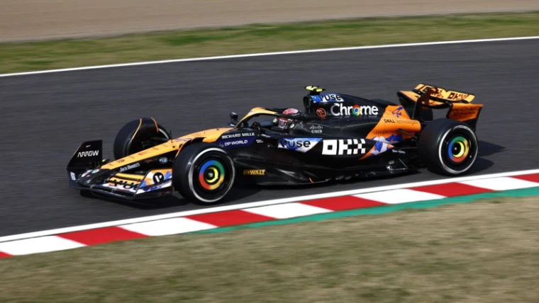 A Formula 1 car on the kerb through the esses at Suzuka during the Formula 1 Japanese Grand Prix, Japan, an early-April engagement in the season calendar of The Mansa Court