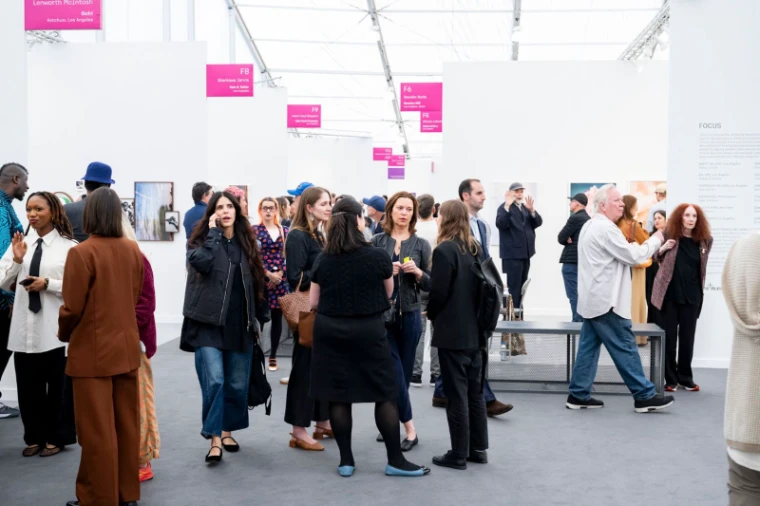 Collectors, dealers and curators talking between the booths of the Focus section at Frieze Los Angeles, an engagement in the season calendar of The Mansa Court
