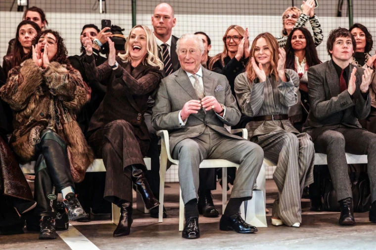 A front row of designers, editors and a royal guest applauding the finale of a London Fashion Week show, an engagement in the season calendar of The Mansa Court