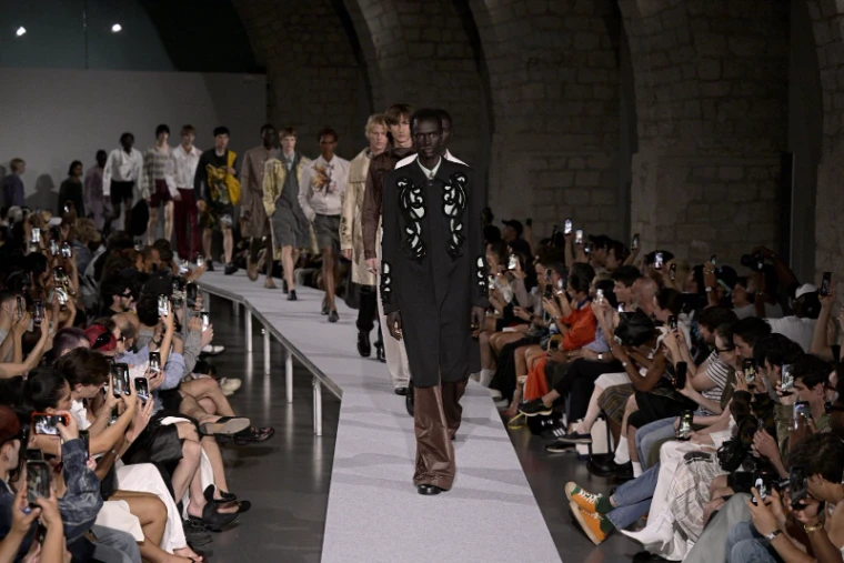 The room at a show during Paris Fashion Week Menswear, an engagement in the season calendar of The Mansa Court