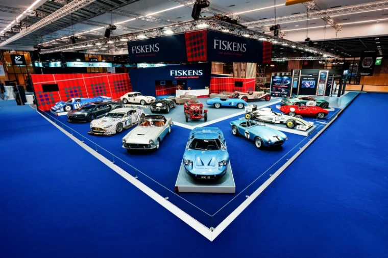 Historic racing and road cars arranged on the Fiskens stand at Rétromobile, Paris, an engagement in the season calendar of The Mansa Court