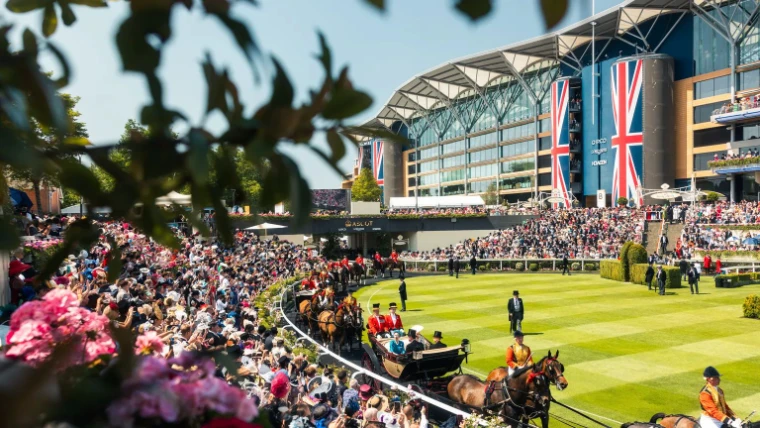 The Royal Procession entering the Parade Ring at Royal Ascot, Union Jack banners on the grandstand, an engagement in the season calendar of The Mansa Court