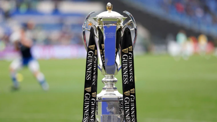 The silver Six Nations Championship trophy with its ribbons on a plinth at the side of the pitch before kick-off, an engagement in the season calendar of The Mansa Court