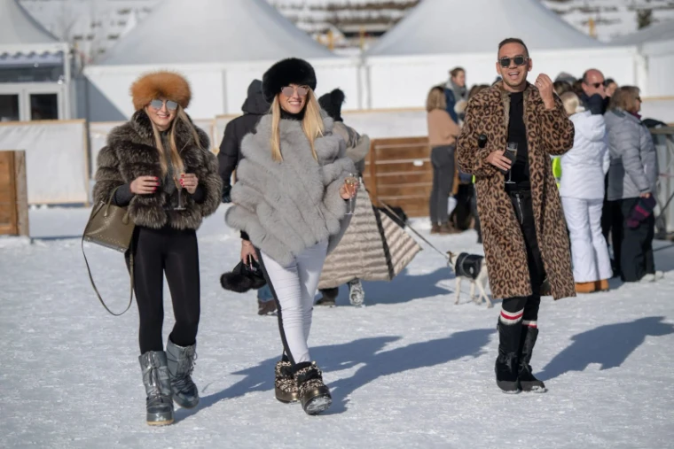 Guests on the ice alongside the field at the Snow Polo World Cup, St. Moritz, an engagement in the season calendar of The Mansa Court