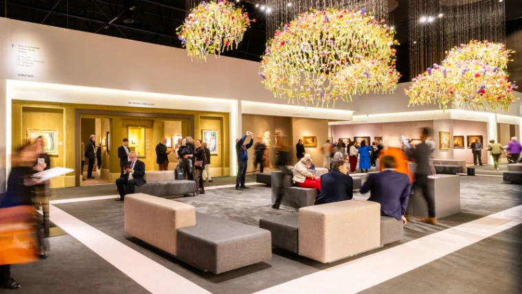 The paintings section of TEFAF Maastricht under suspended flower chandeliers, Maastricht, the Netherlands, a March engagement in the season calendar of The Mansa Court