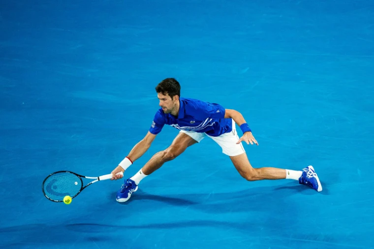 A night match at the Australian Open, Melbourne Park, the court glowing against the dark, an engagement in the season calendar of The Mansa Court