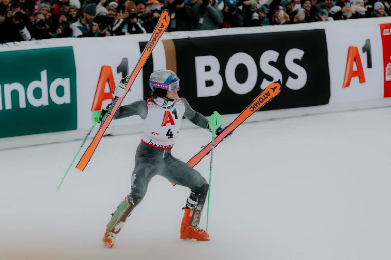 A slalom racer celebrating in the finish at the Hahnenkamm Races, Kitzbühel, an engagement in the season calendar of The Mansa Court