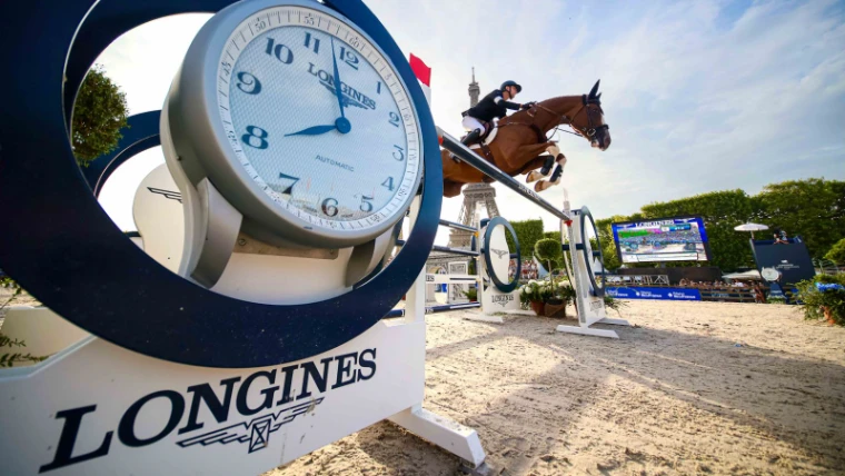 The show jumping arena on the Champ de Mars beneath the Eiffel Tower, flags and full grandstand at the Longines Global Champions Tour, Paris, an engagement in the season calendar of The Mansa Court