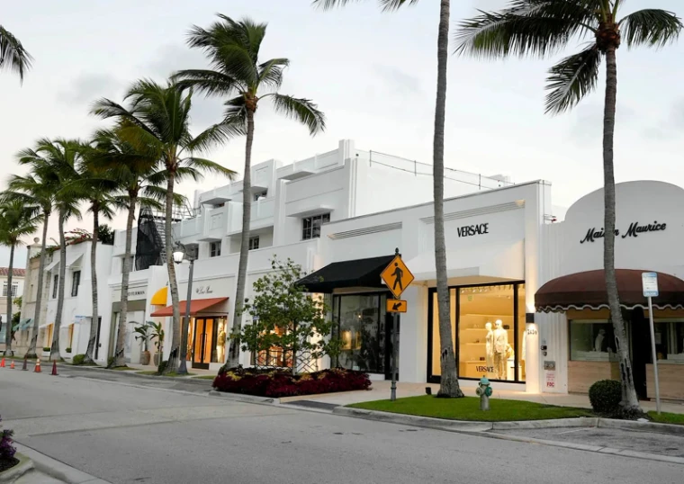 The boutiques of Worth Avenue lit at dusk in Palm Beach, Florida, during The Palm Beach Season, an engagement in the season calendar of The Mansa Court