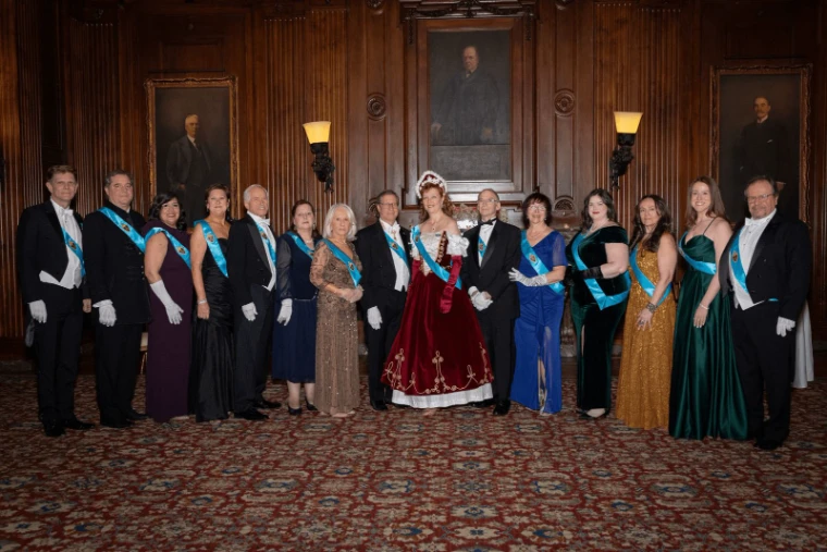 The committee of the Piarist Debutante Ball in sashes at The University Club, New York, before the evening begins, an engagement in the season calendar of The Mansa Court