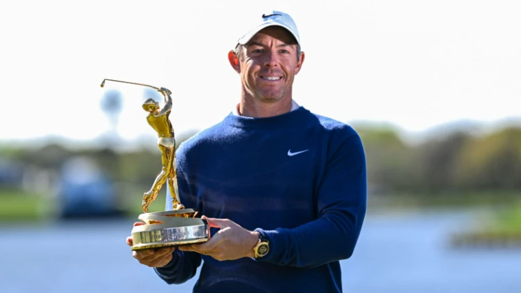 The champion holding the gold trophy after the final round of The Players Championship, Ponte Vedra Beach, Florida, in the season calendar of The Mansa Court