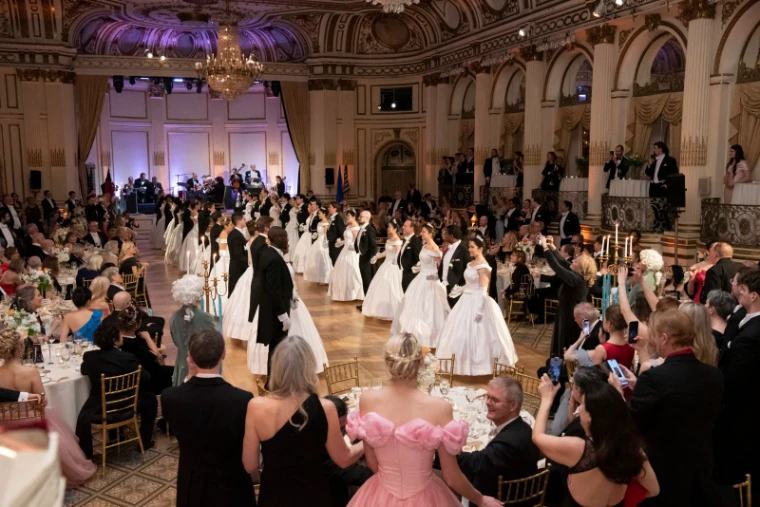The presentation of debutantes in white gowns and escorts in white tie at The Quadrille Ball, The Plaza, New York, an engagement in the season calendar of The Mansa Court