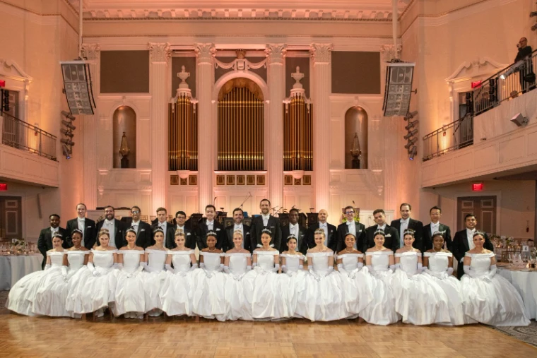 Group portrait of the debutantes and escorts of The Quadrille Ball, New York, an engagement in the season calendar of The Mansa Court