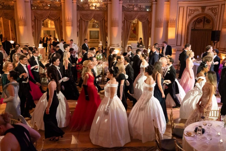Guests in white tie dancing in the Grand Ballroom of The Plaza during The Quadrille Ball, New York, an engagement in the season calendar of The Mansa Court