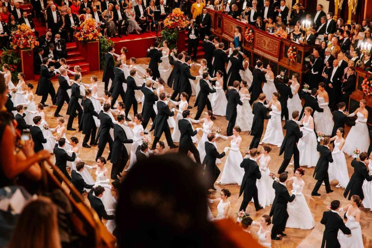 Debutante couples in the opening polonaise of a ball in the Vienna Ball Season, an engagement in the season calendar of The Mansa Court