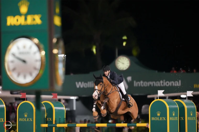 A night class jumped under lights at Saturday Night Lights, the Winter Equestrian Festival in Wellington, Florida, an engagement in the season calendar of The Mansa Court