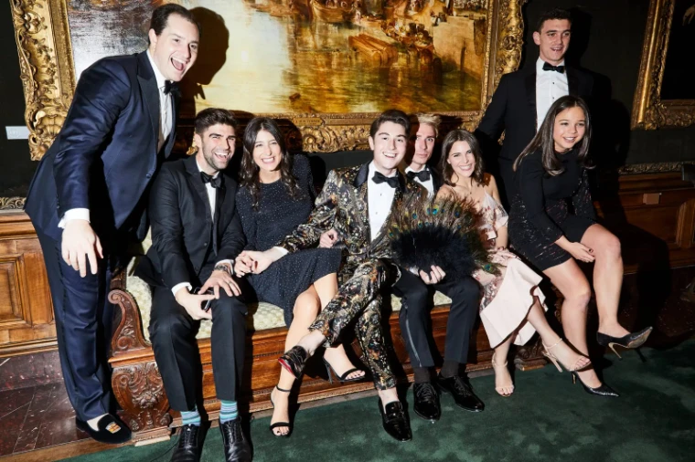 Guests seated beneath a Turner canvas at The Young Fellows Ball, the black-tie evening in the Frick’s galleries in New York, a March engagement in the season calendar of The Mansa Court